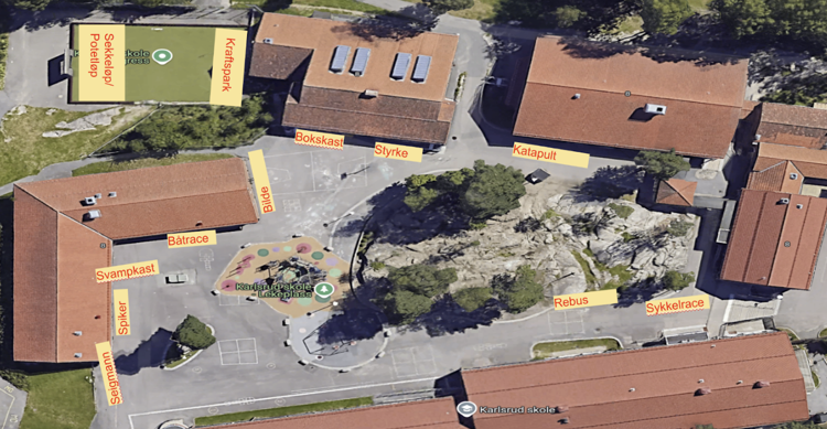 Et oversiktsbilde av byggene og aktiviteter på 17.mai på Karlsrud skole